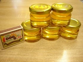 100 jars of bee honey 25 ml. / golden metal caps /