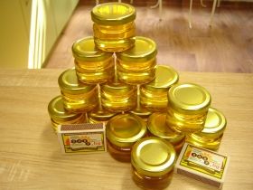 100 jars of bee honey 25 ml. / golden metal caps /